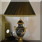 D07. One of a pair of urn-shaped marble lamps. 